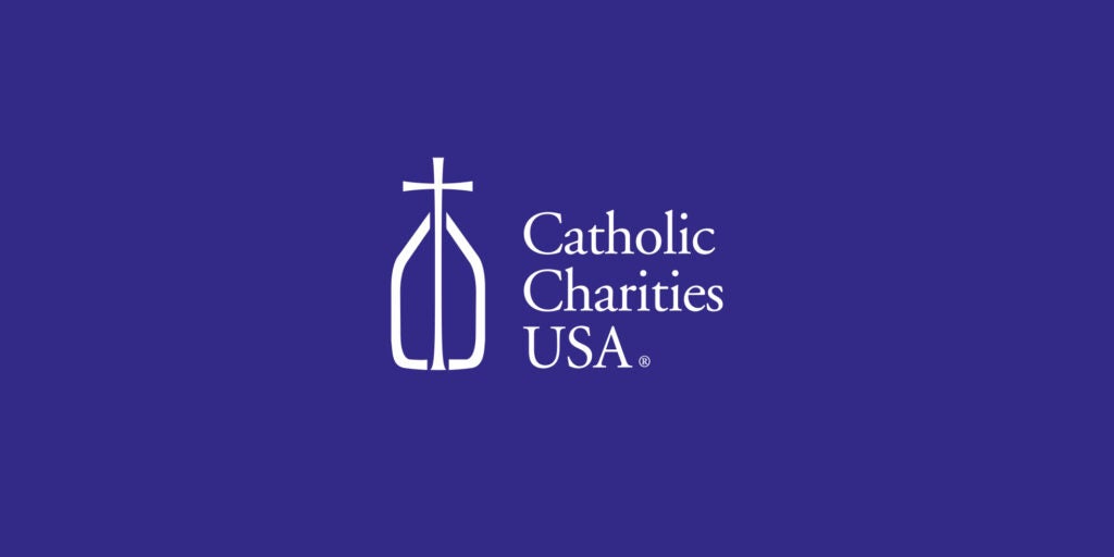 Catholic Charities USA Logo on a purple background.